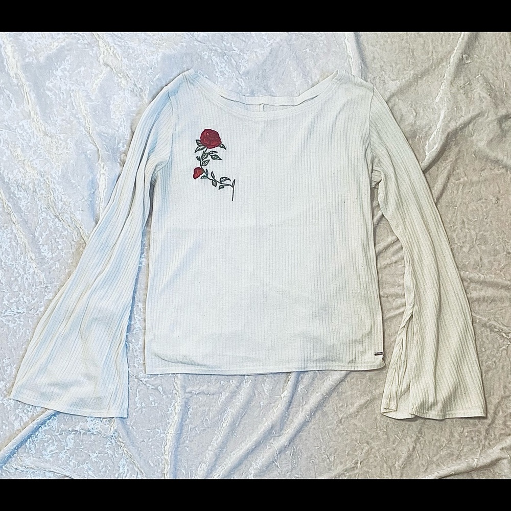White long sleeve blouse with embroidered rose